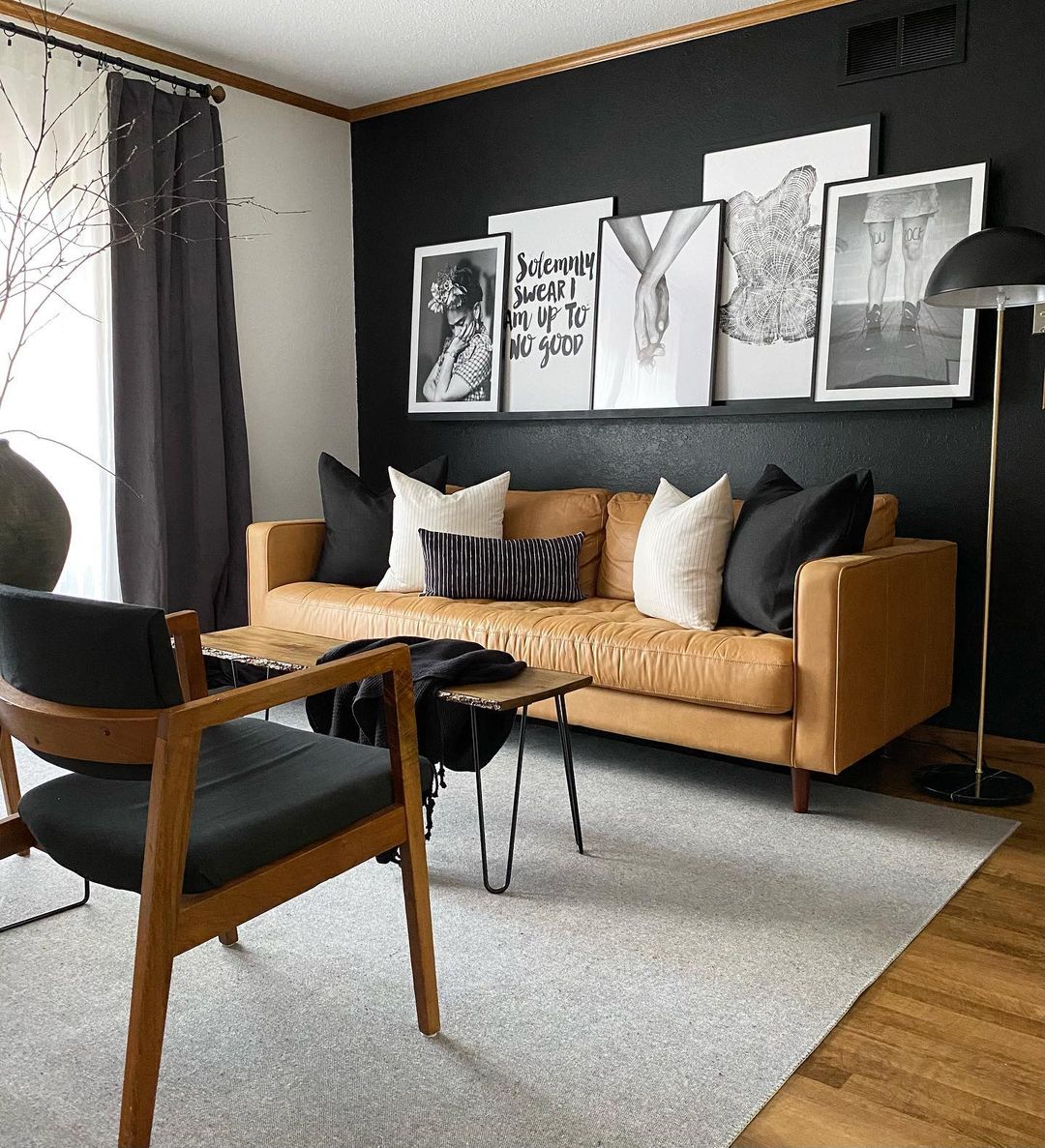 Bold Living Room with Black and White Picture Ledge Display