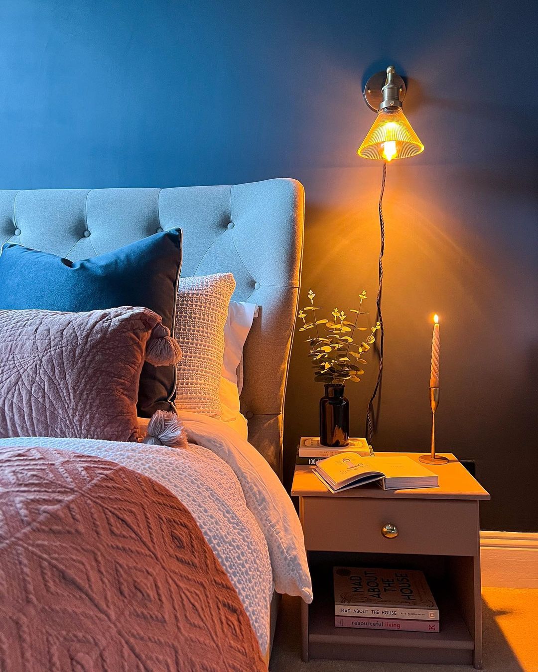 Warm Wall Sconce for a Cozy Bedroom Ambiance