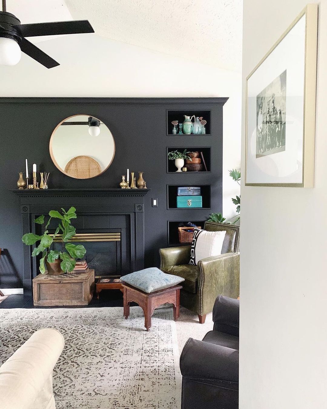 Sophisticated Living Room with Bold Black Fireplace