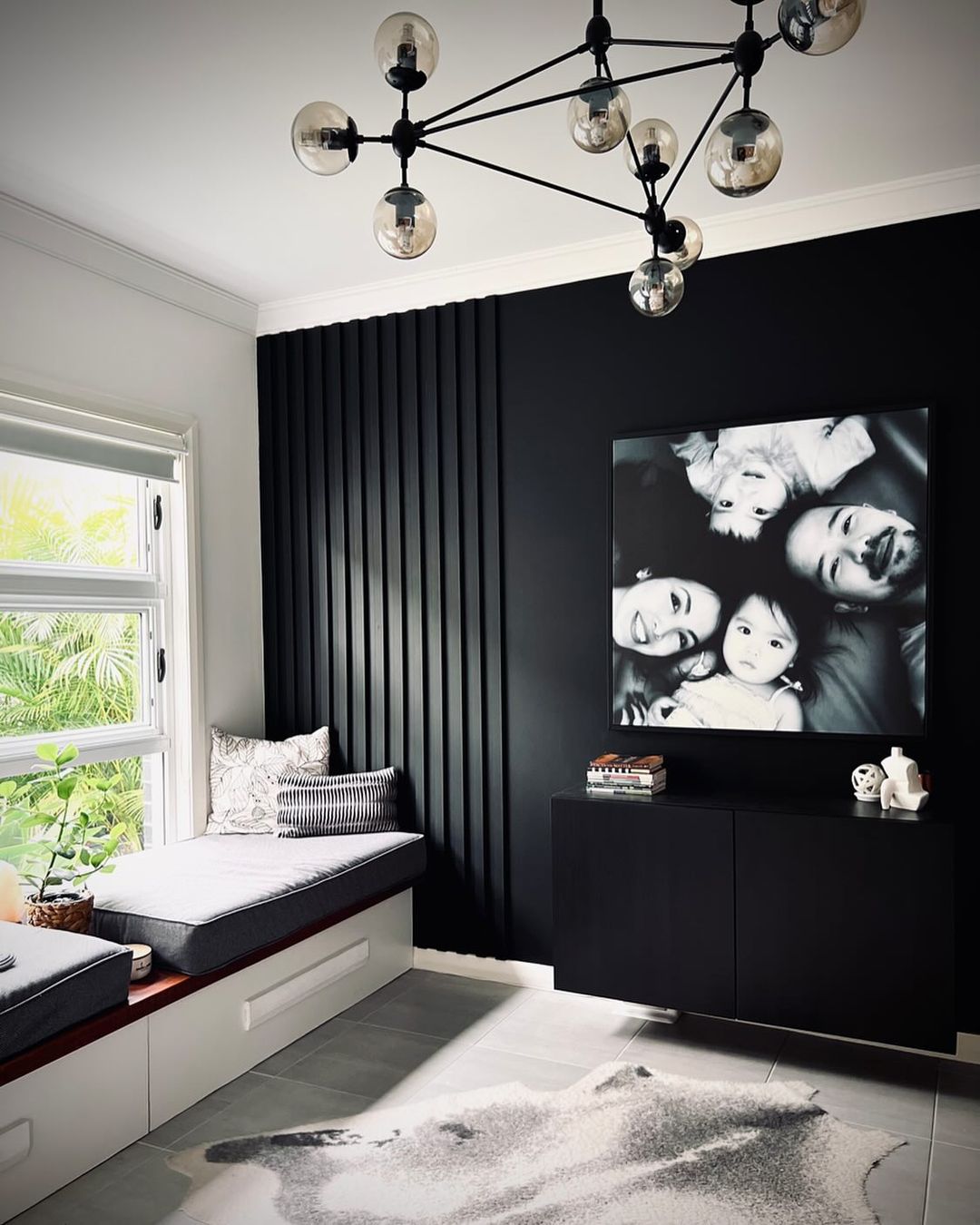 Modern Sitting Area with Striking Black Wall