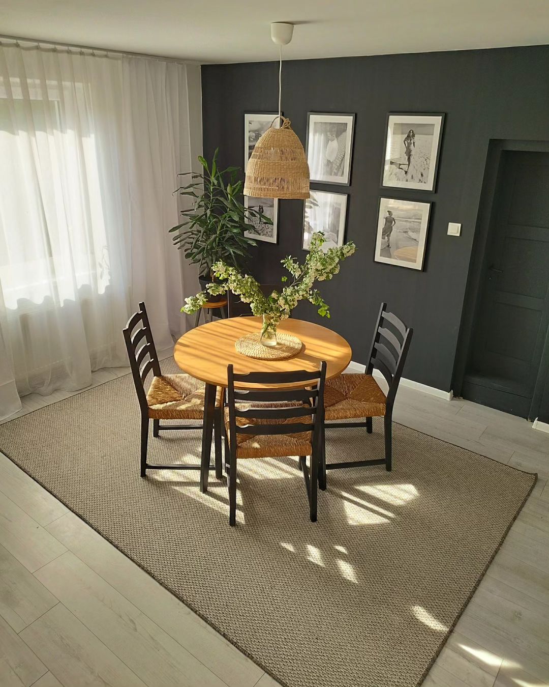  Bright Dining Room with Contrasting Black Wall