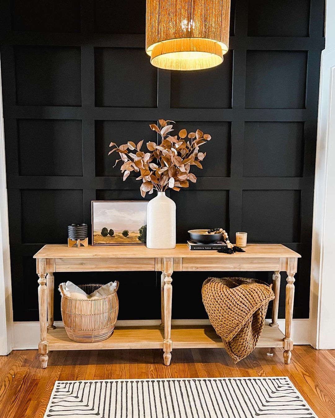 Elegant Entryway with Black Accent Wall