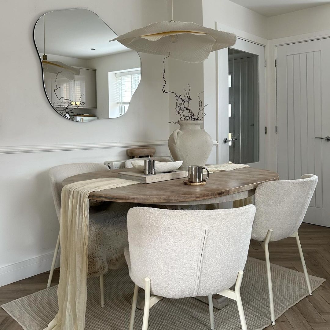 Contemporary Dining Room with Organic Mirror