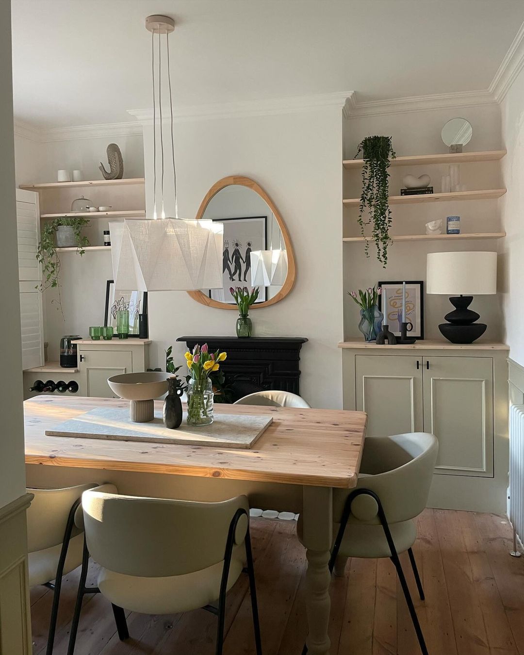 Inviting Dining Room with Oval Mirror