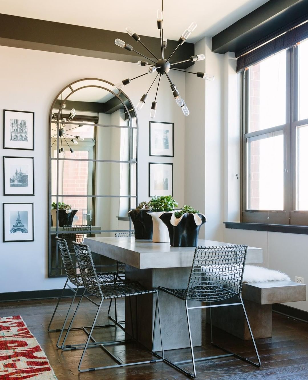 Industrial Dining Room with Arched Mirror