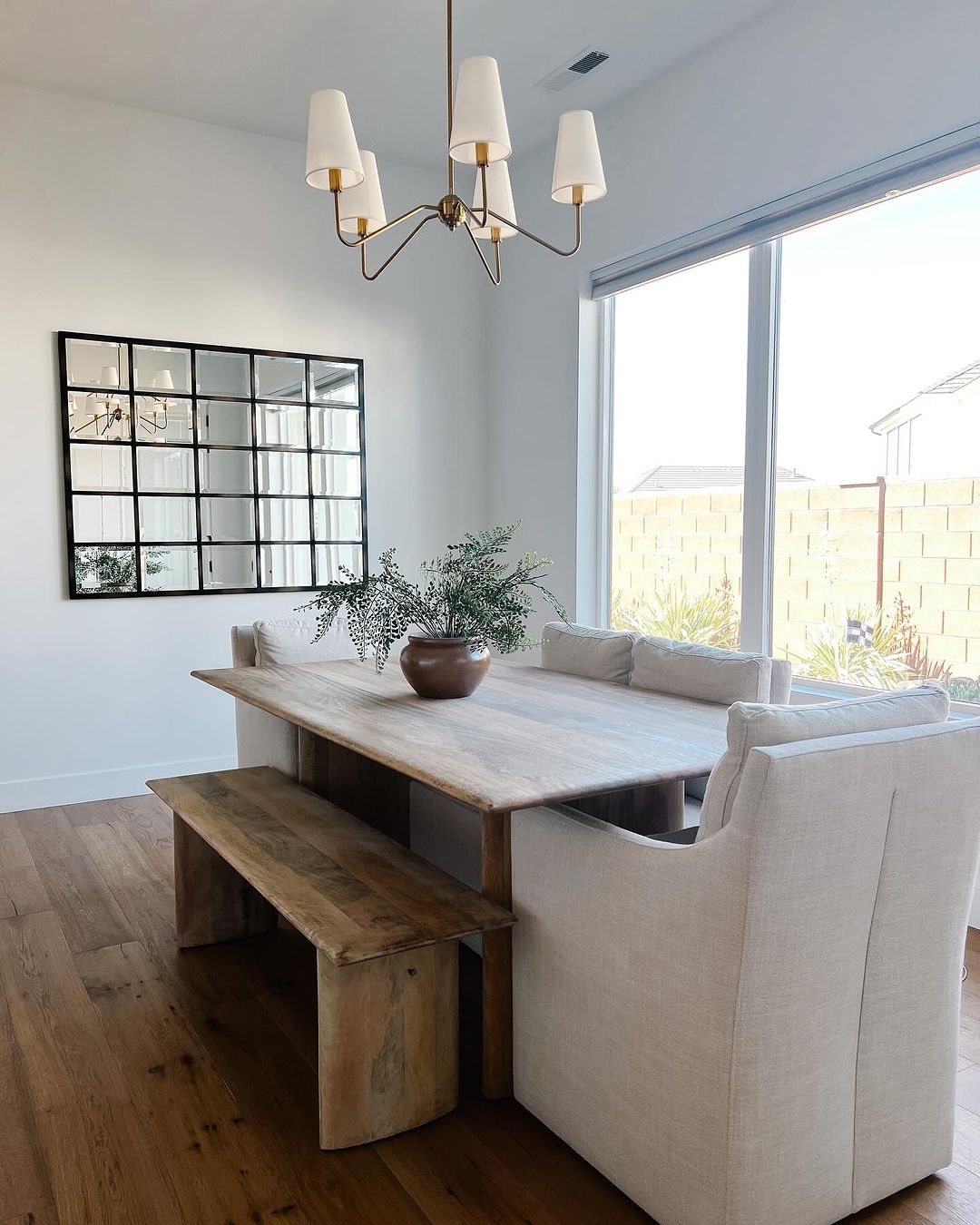 Contemporary Dining Room with Grid Mirror