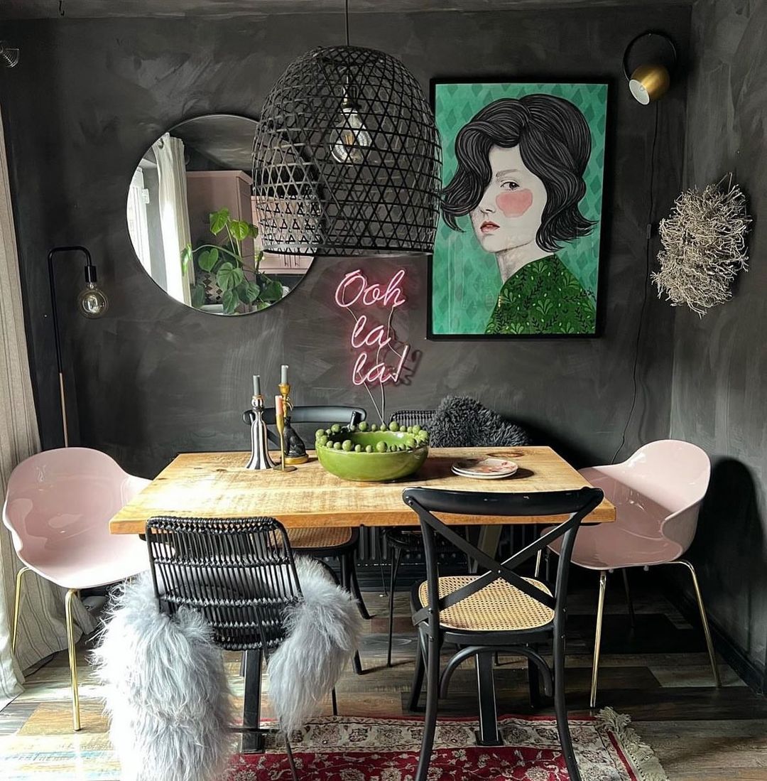 Eclectic Dining Room with Round Mirror