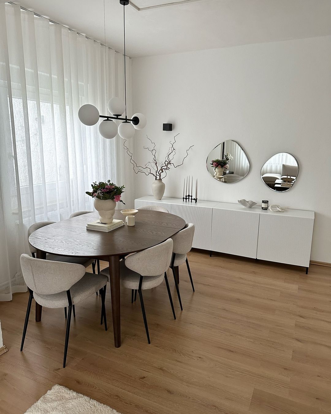 Modern Dining Room with Organic Mirrors