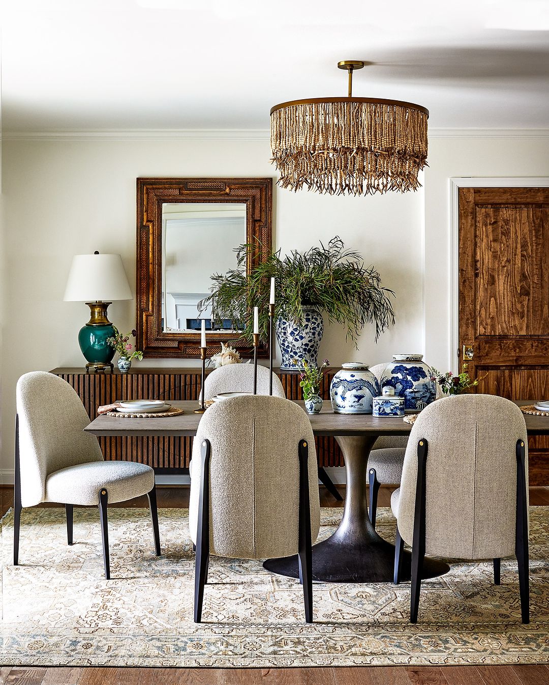 Eclectic Dining Room with Ornate Mirror