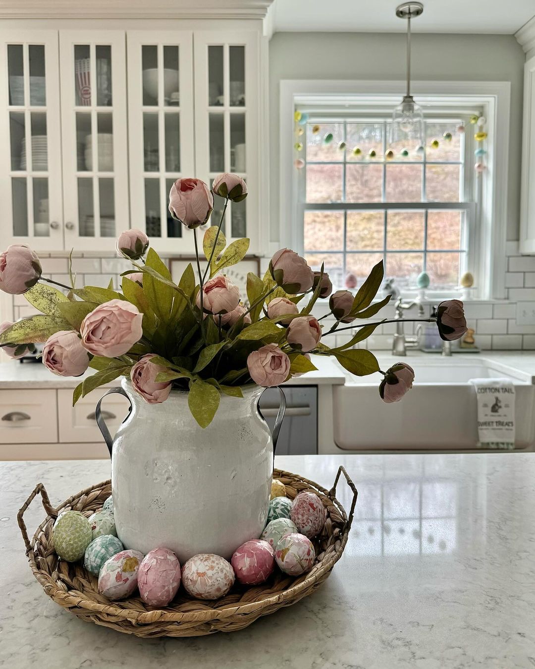 Seasonal Decor with Pastel Florals and Eggs for a Festive Touch