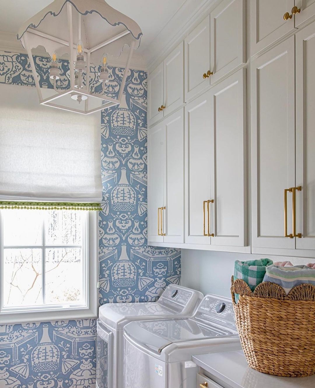 Elegant Laundry Room with Bold Wallpaper and Ample Storage