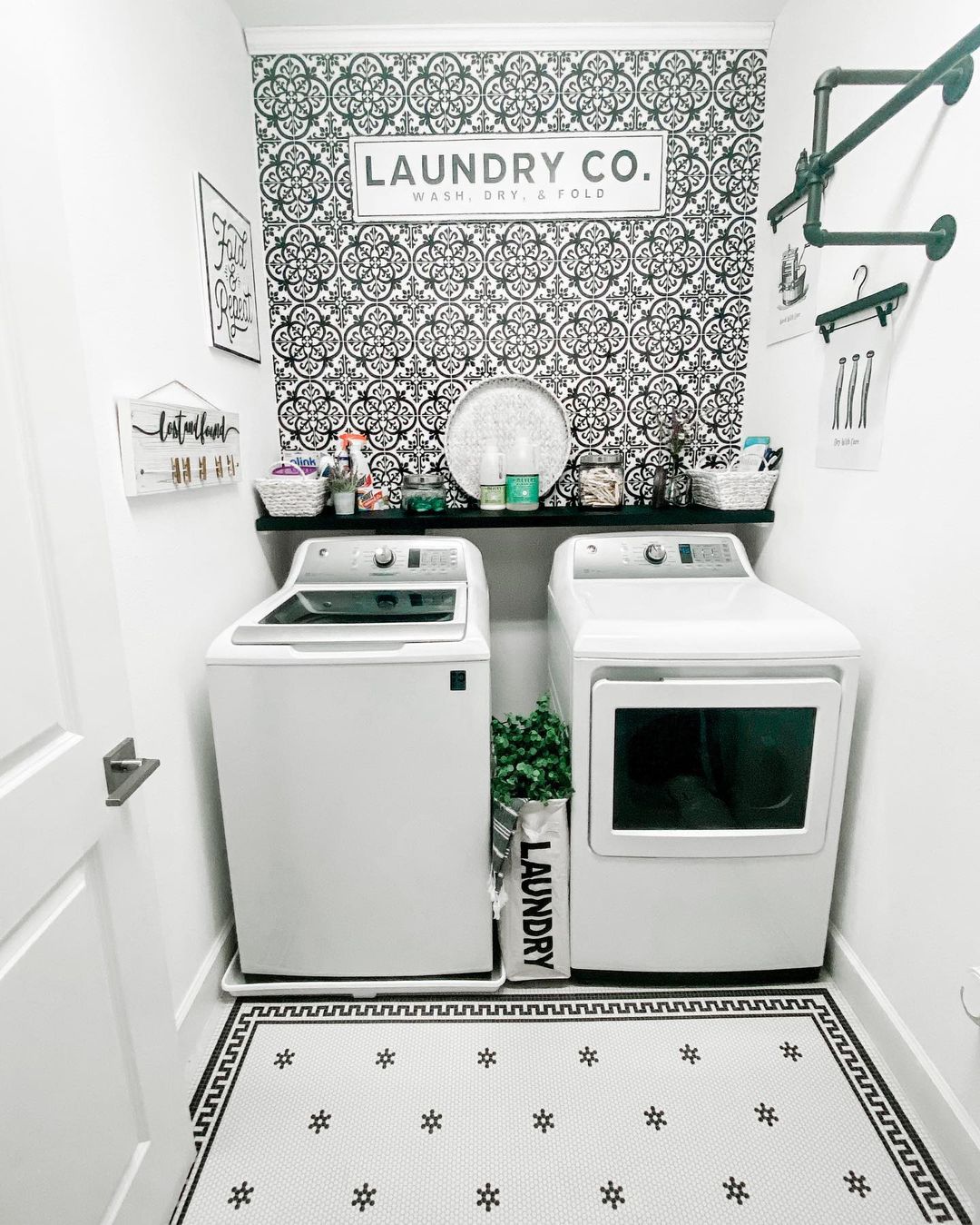 Stylish Monochrome Laundry Room with Statement Wallpaper