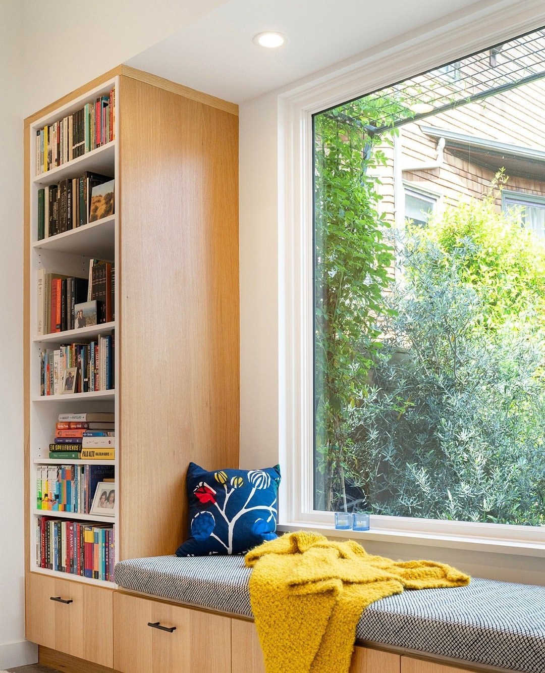 Bright Reading Nook with Large Window and Built-in Bench