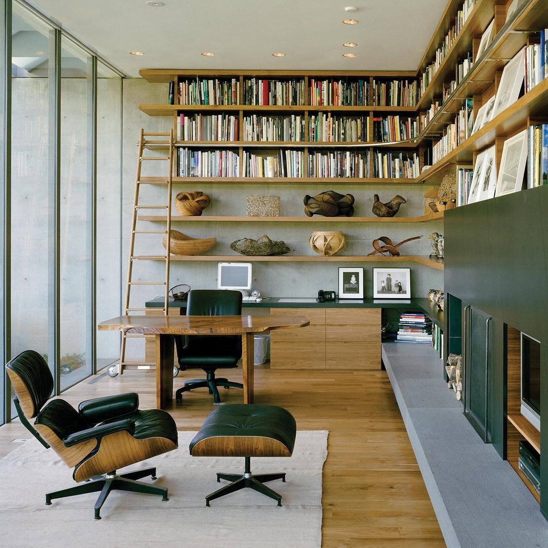 Modern Reading Room with Wall-to-Wall Shelving