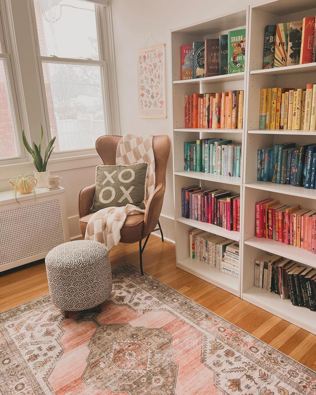 Bright and Cozy Reading Nook with Color-Coded Books