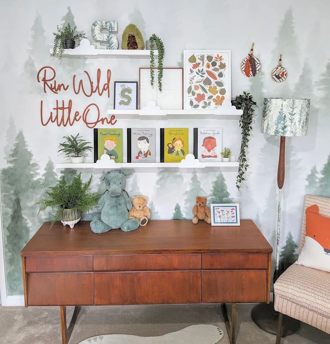 11. Inspire Exploration with Woodland Wall Art and Shelves