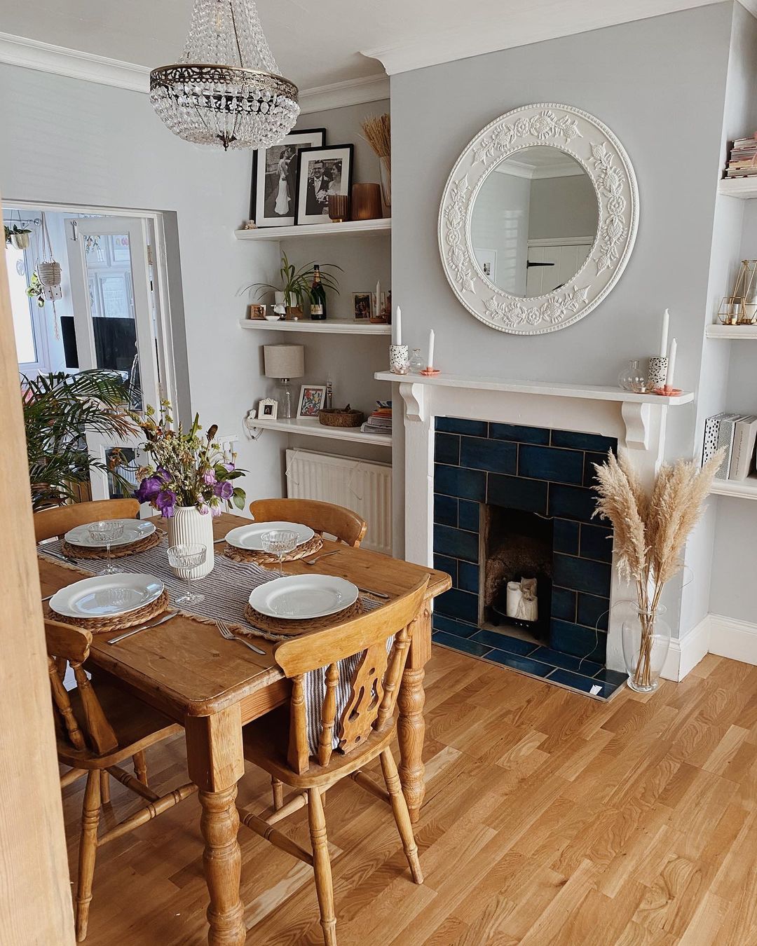 Cozy Eclectic Dining Room with a Tiled Fireplace