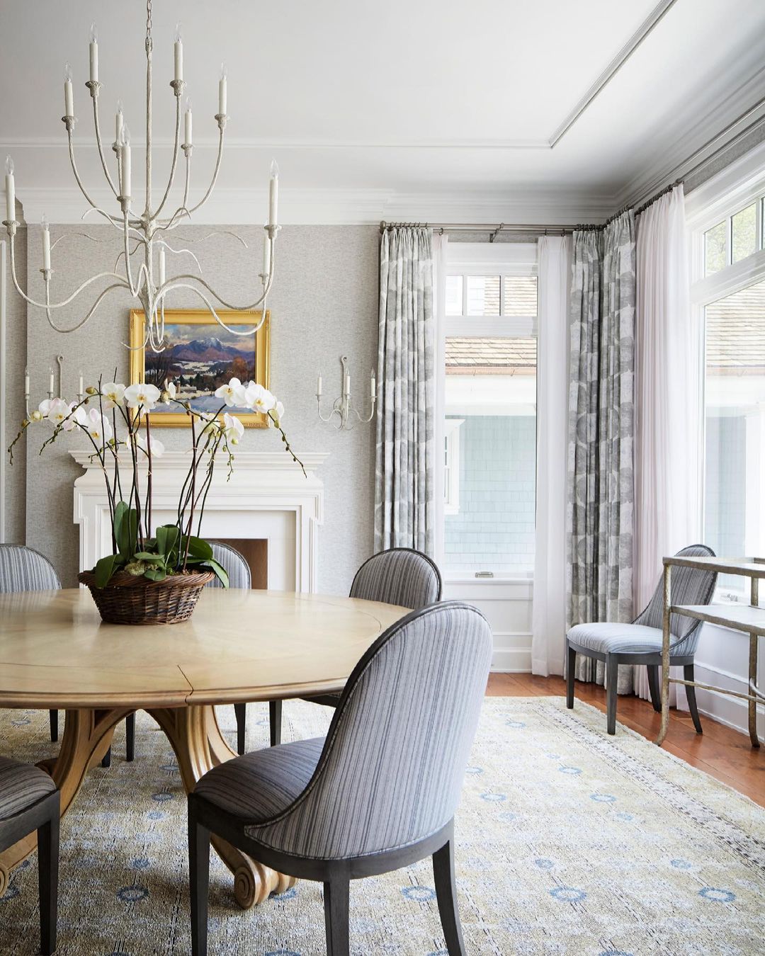 Elegant Traditional Dining Room with a White Fireplace