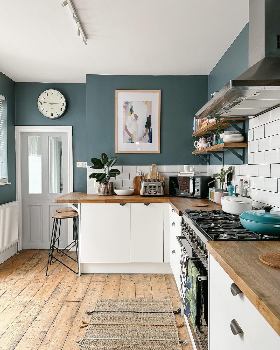 Modern Blue and White Kitchen with Rustic Elements