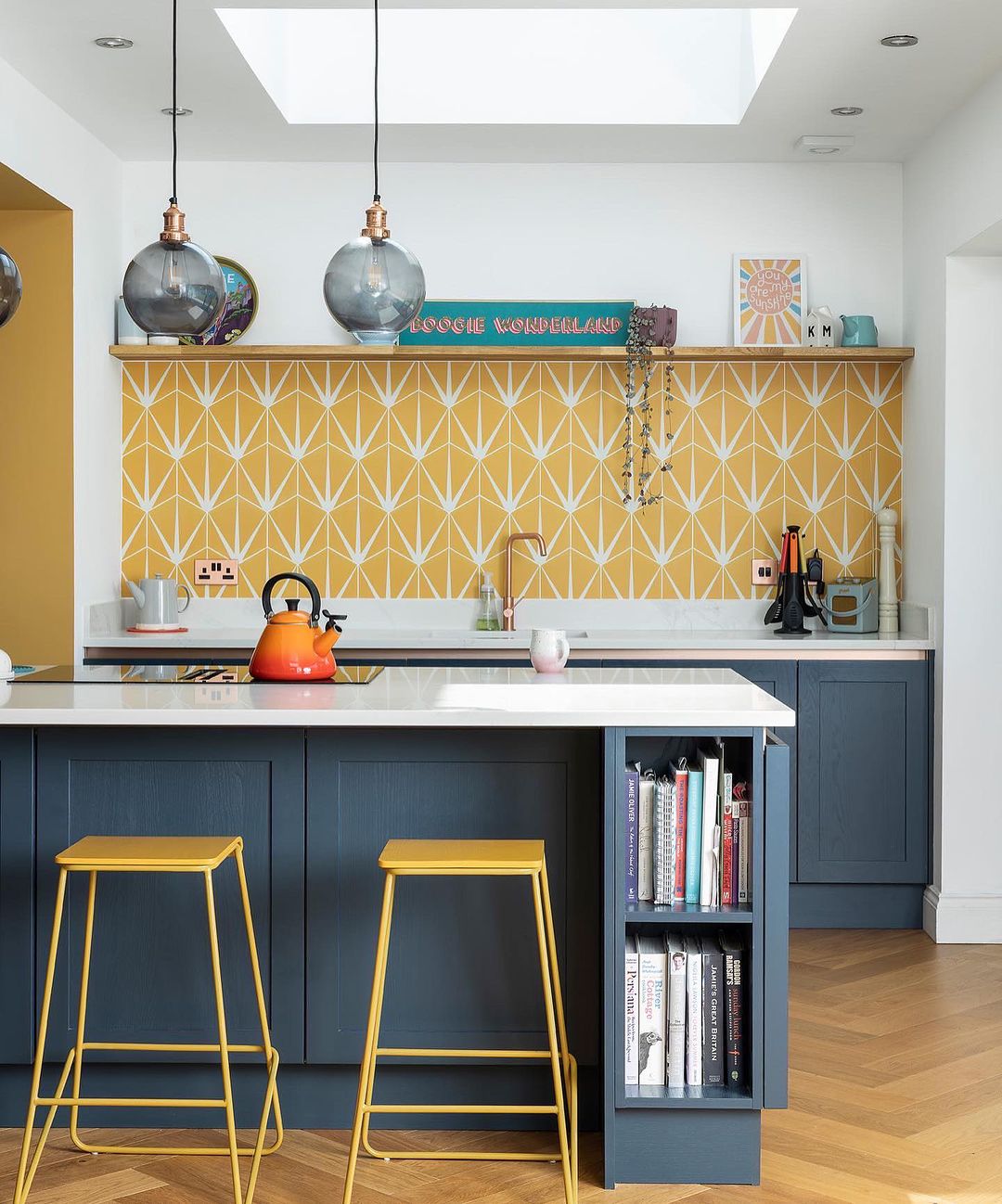 Dark Blue Cabinets with Bright Yellow Backsplash