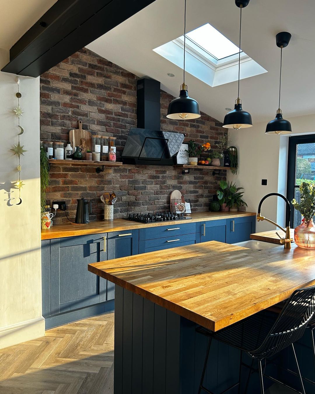 Rustic Blue Cabinets with Brick Accent Wall