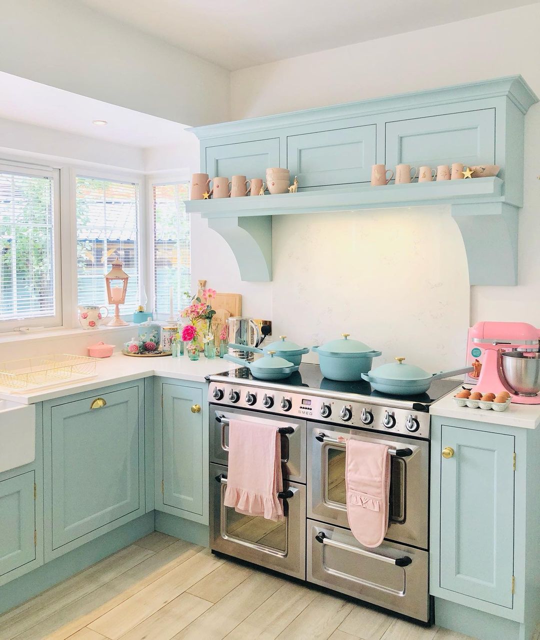 Pastel Blue Cabinets with Vintage Flair