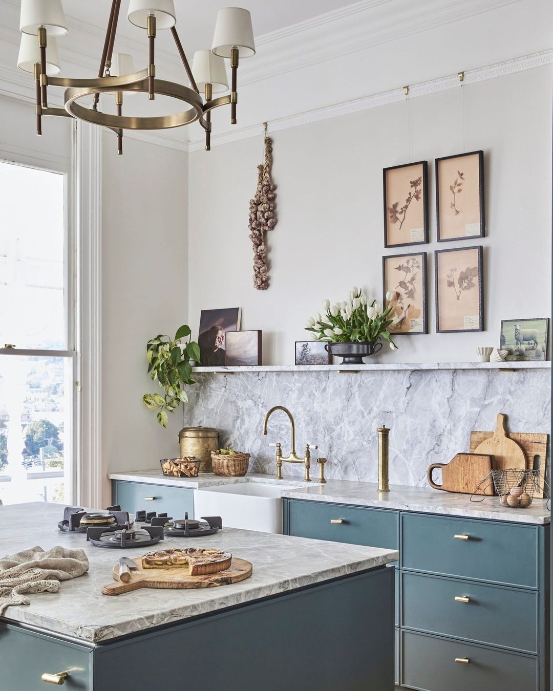 Elegant Blue Cabinets with Marble Accents