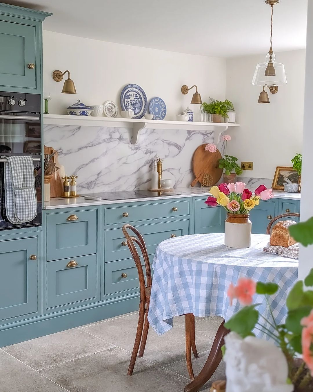 Soft Blue Cabinets with Classic Elegance