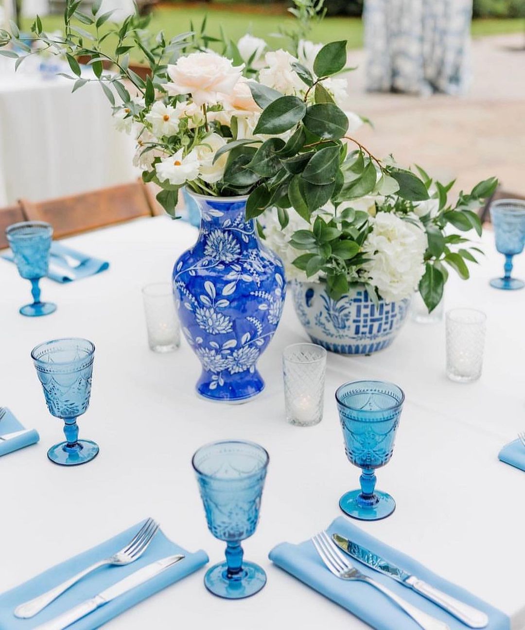 Vibrant Blue Glass and Floral Centerpiece