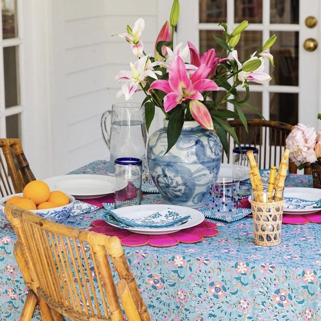 Vibrant Pink Lily and Blue Vase Centerpiece