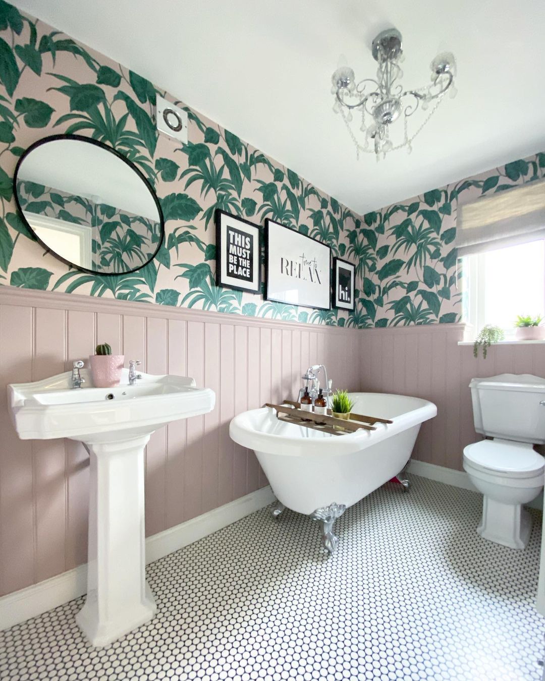 Tropical Wallpaper and Elegant Fixtures for a Refreshing Bathroom