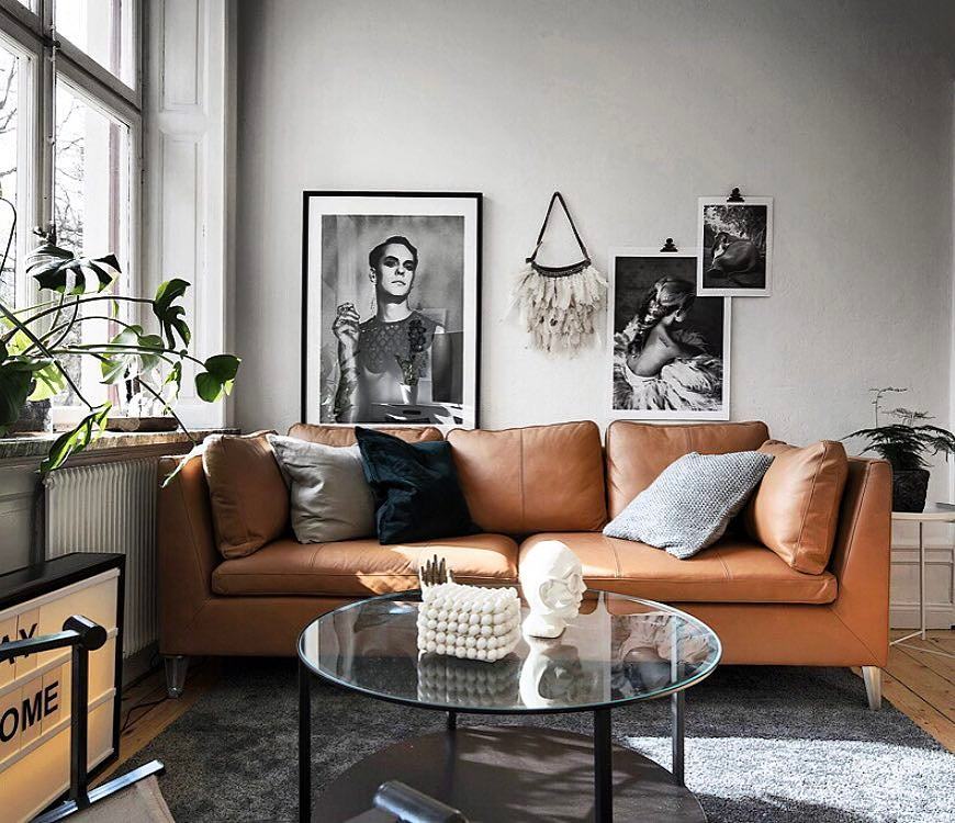 Infuse Artistic Flair with a Tan Couch and Bold Decor