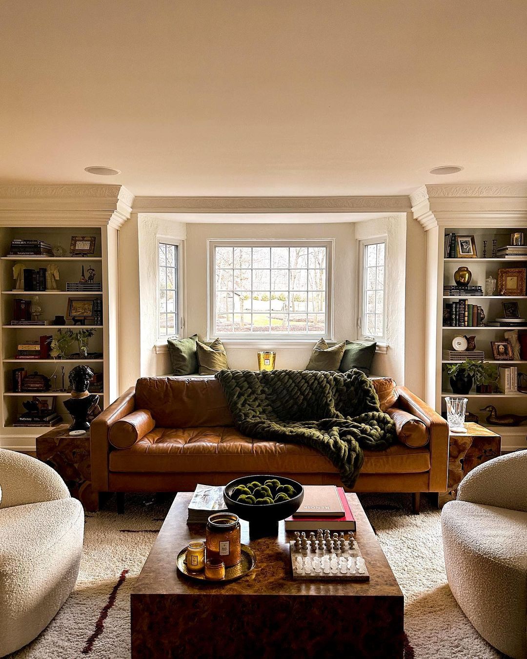 15. Create a Cozy Reading Nook with a Tan Couch and Rich Textures