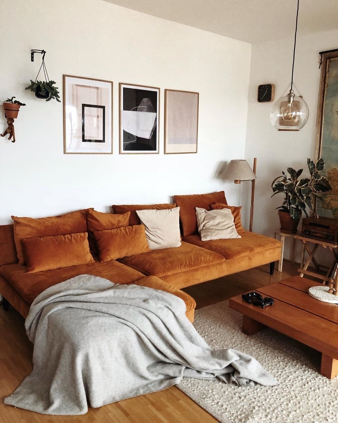 Embrace Warm Tones with a Tan Couch and Minimalist Decor