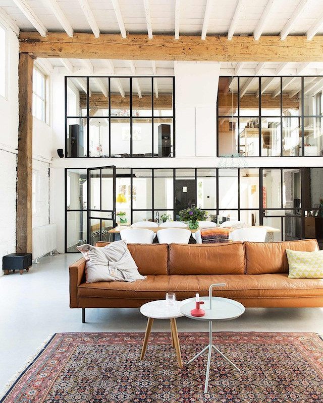 Create a Loft-Style Living Room with a Tan Couch and Industrial Accents