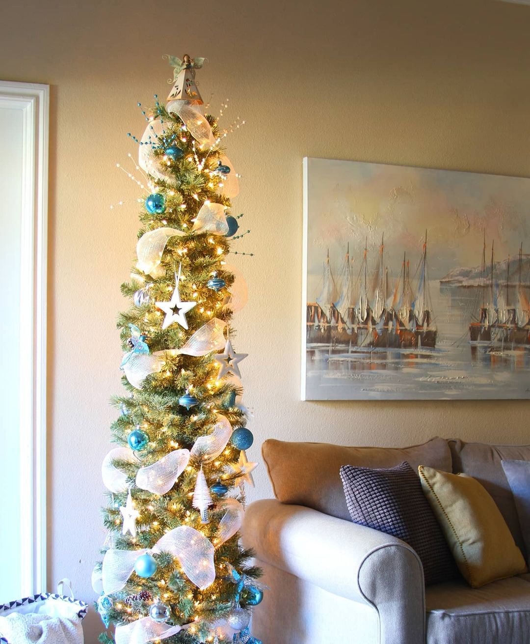 Add a Coastal Touch to Your Living Room with a Slim Christmas Tree