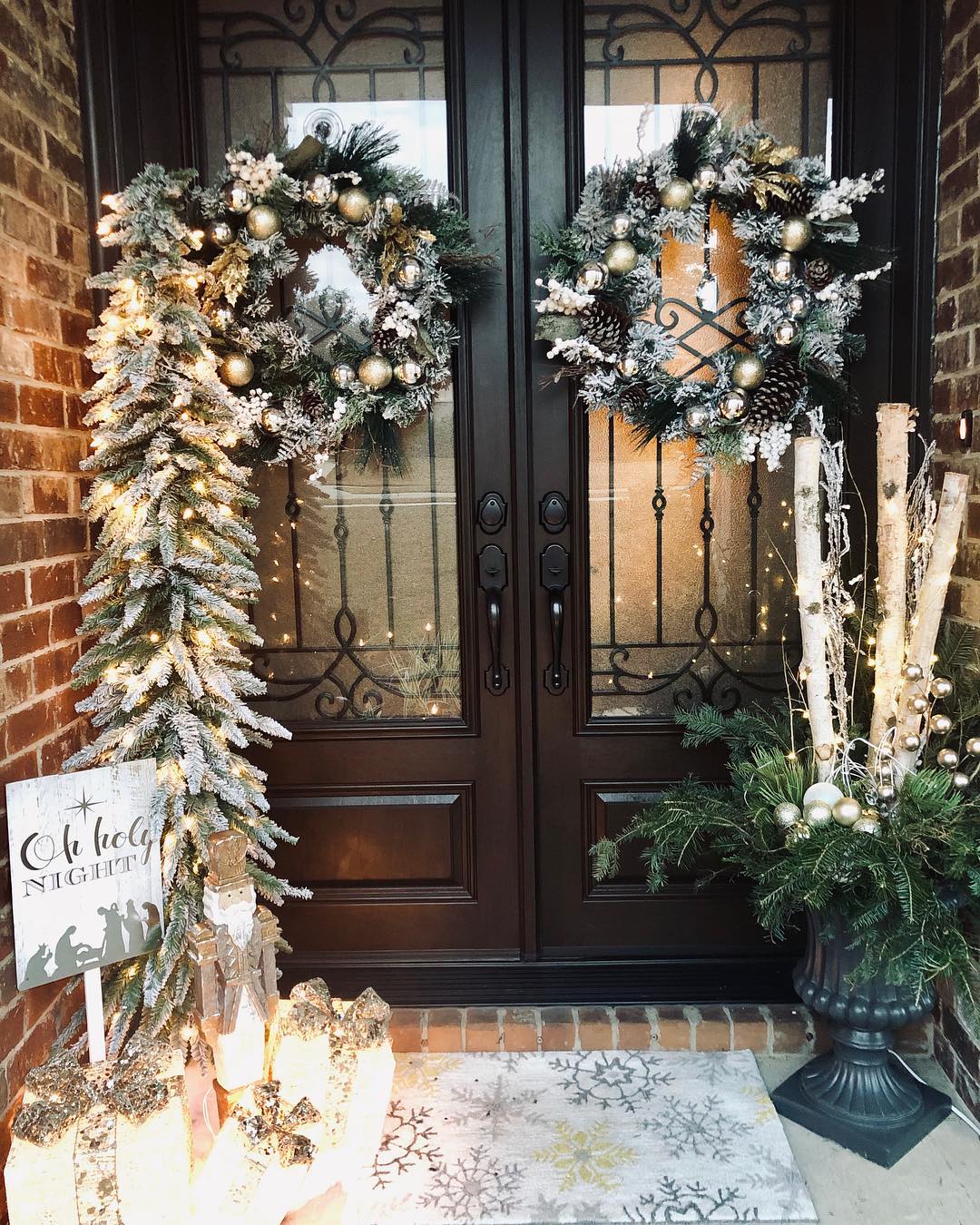 Create a Welcoming Entrance with a Slim Christmas Tree and Elegant Wreaths