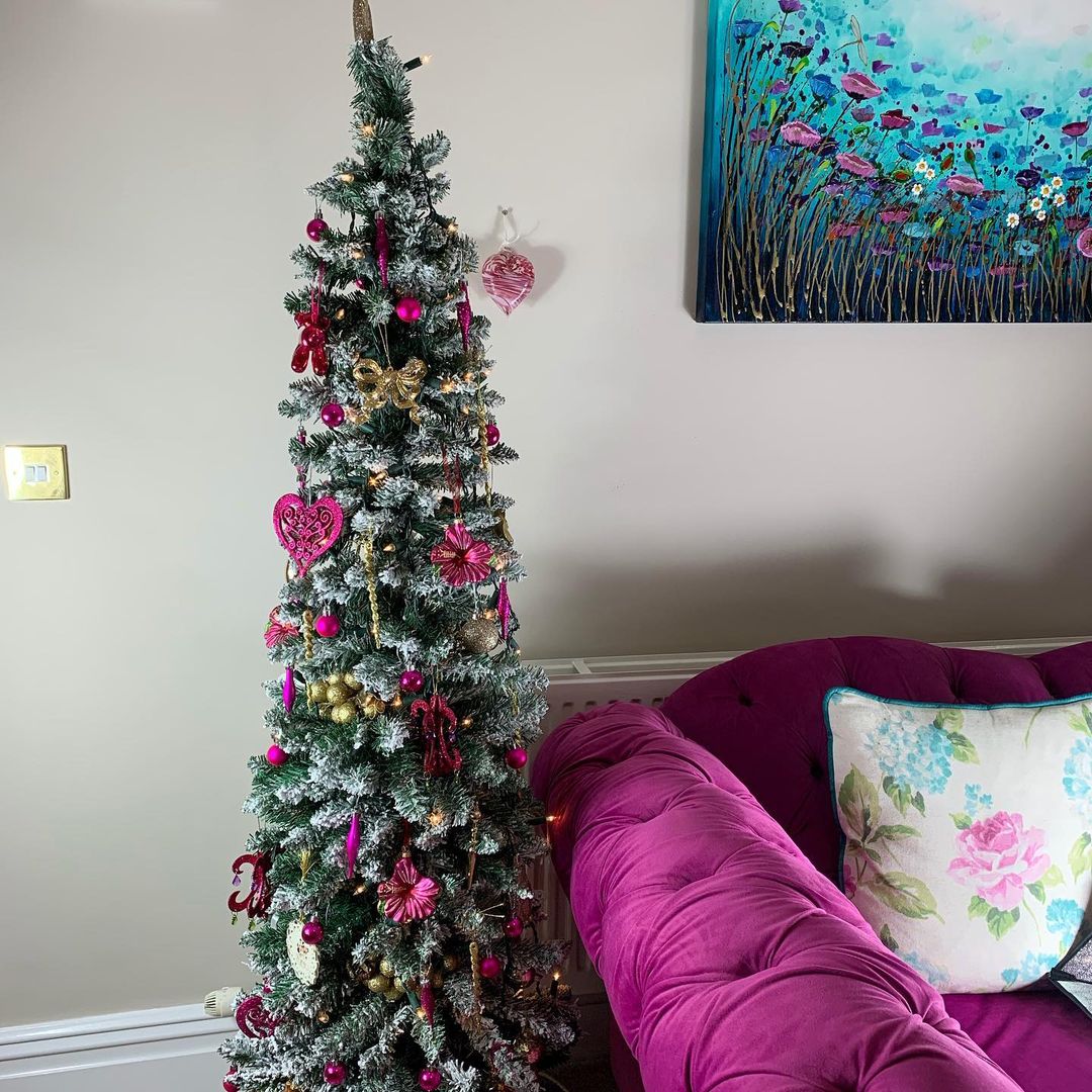 Infuse Vibrant Colors into Your Living Room with a Slim Christmas Tree