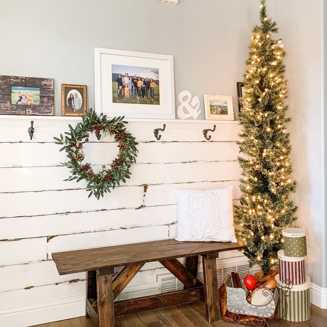 Create a Rustic Entryway with a Slim Christmas Tree and Simple Accents