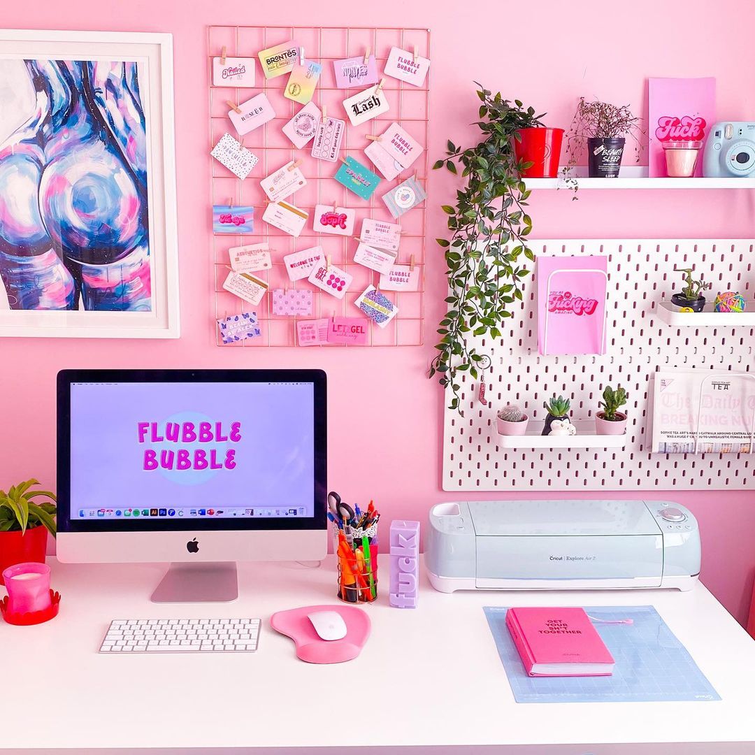 Creative and Functional Pink Office with Art and Plants