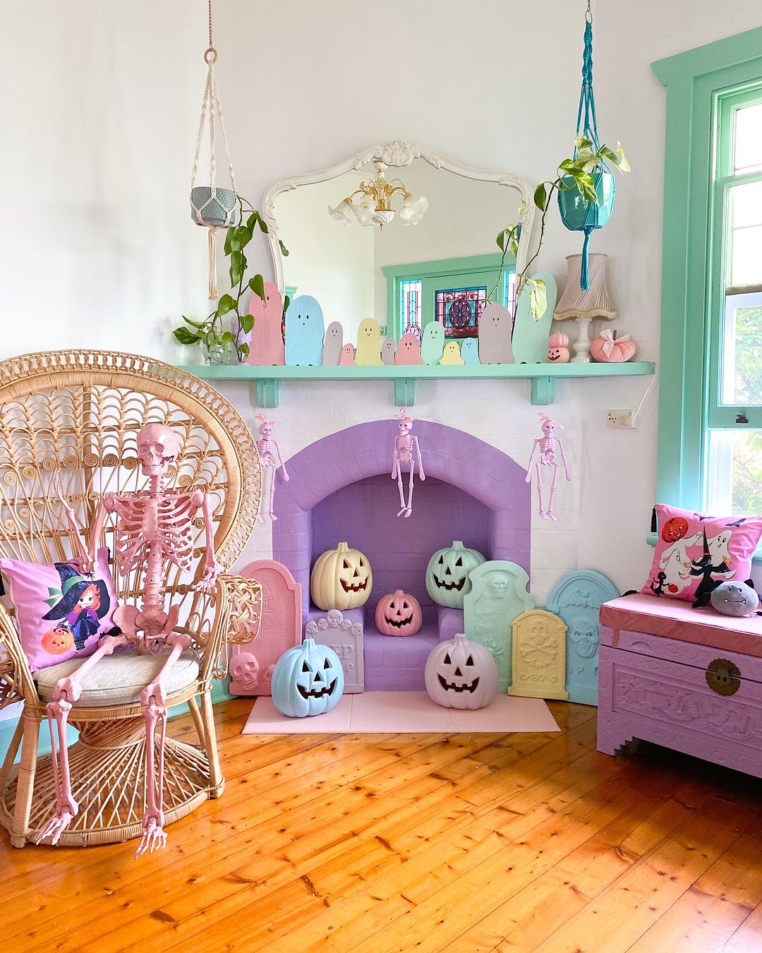 Whimsical Pink Halloween Fireplace with Colorful Decor