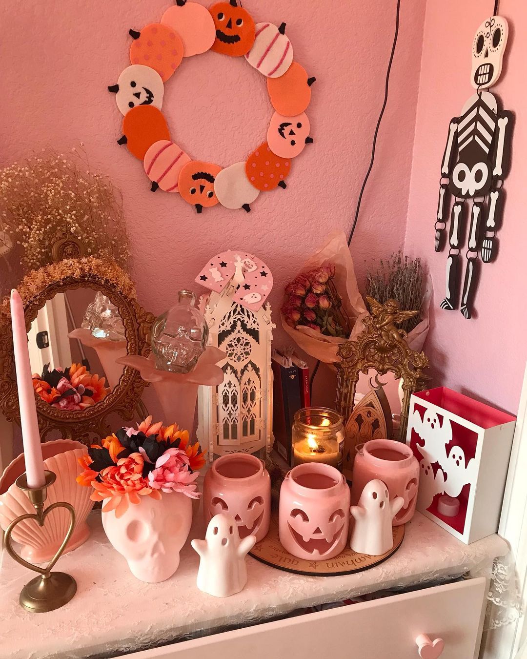 Charming Pink Halloween Display with Adorable Accents