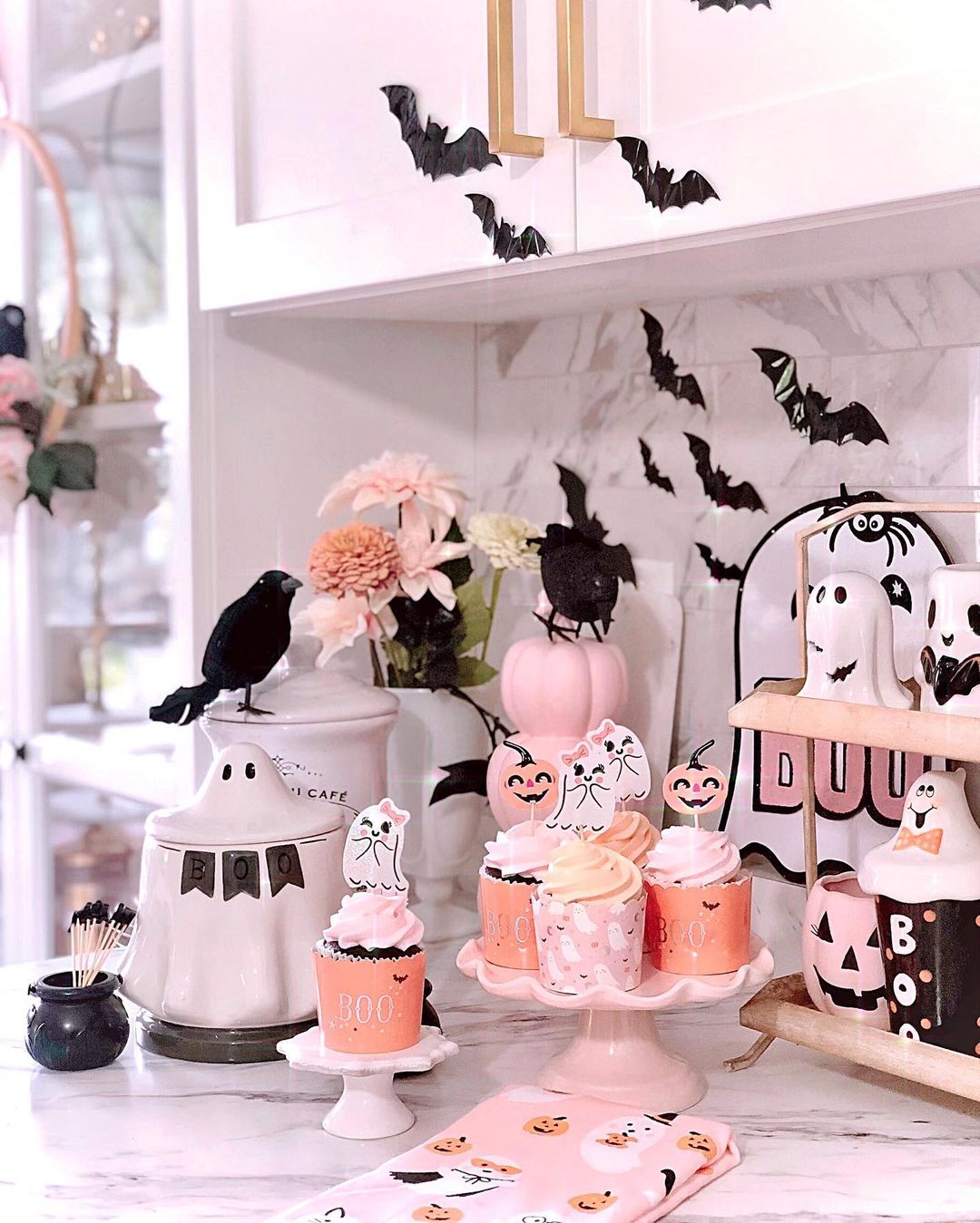 Festive Pink Halloween Kitchen Decor with Sweet Treats