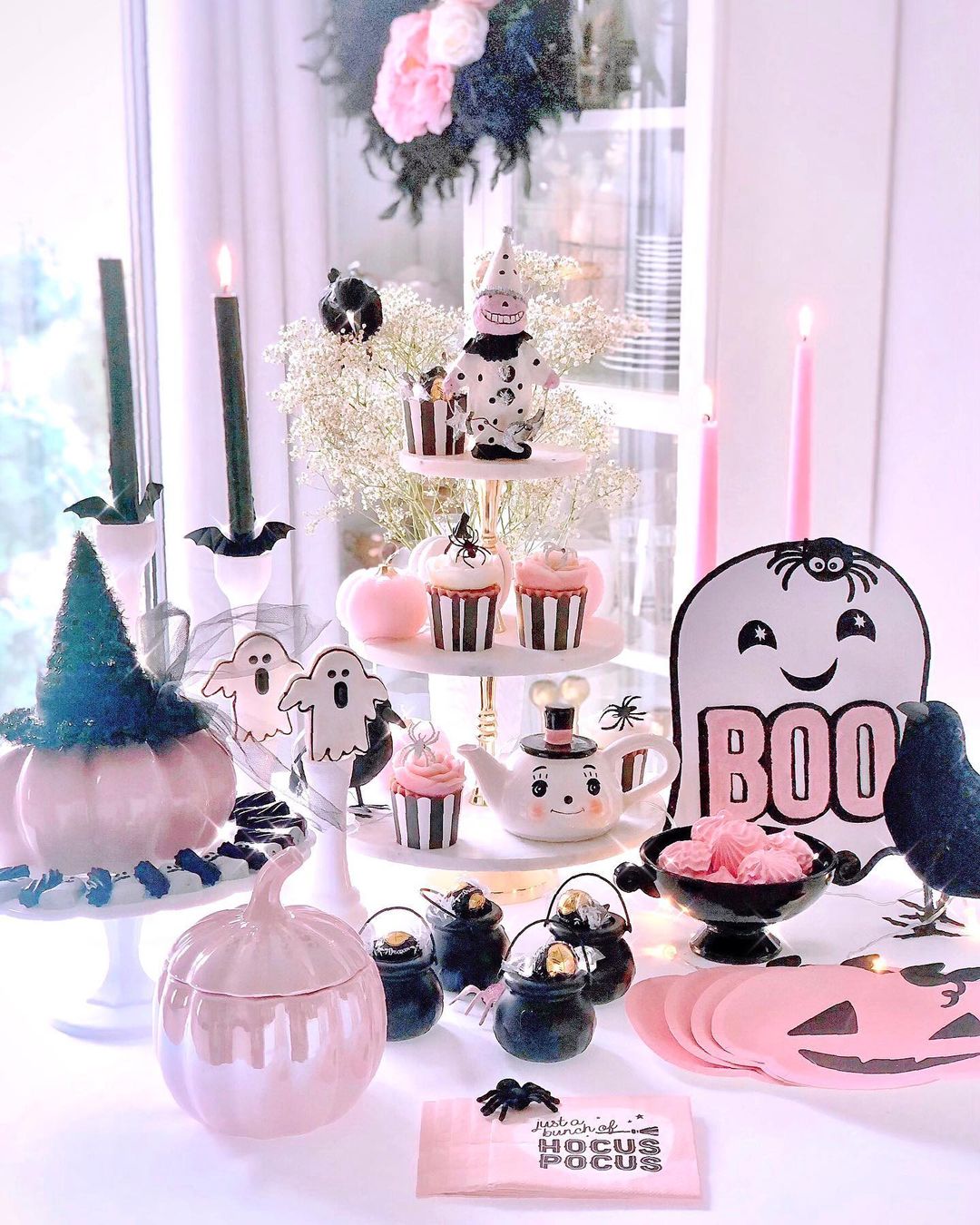 Enchanting Pink Halloween Dessert Table with Spooky Sweets