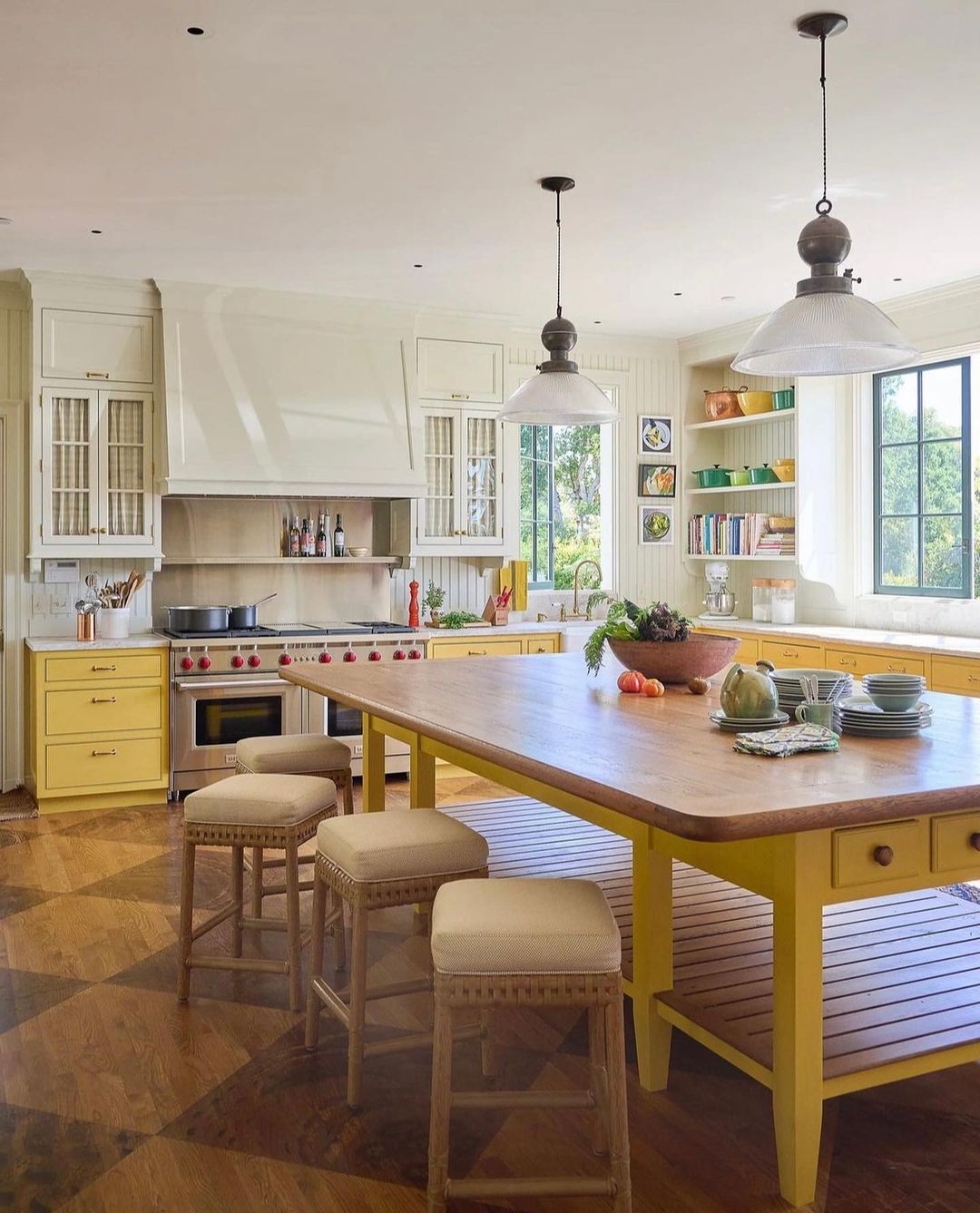 Spacious Yellow Kitchen Island with Classic Details