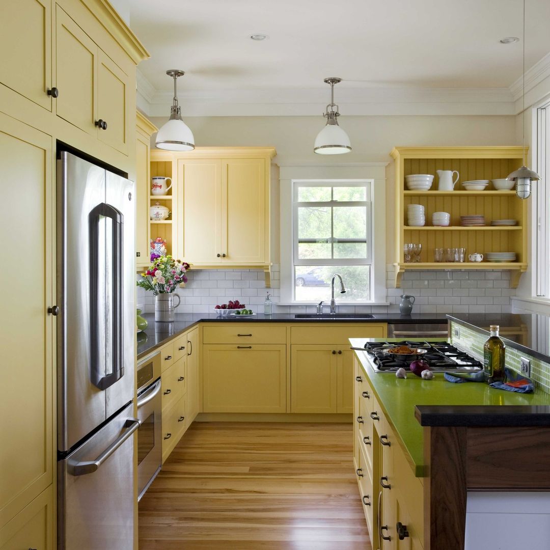 Bright Yellow Cabinets with Stainless Steel Accents