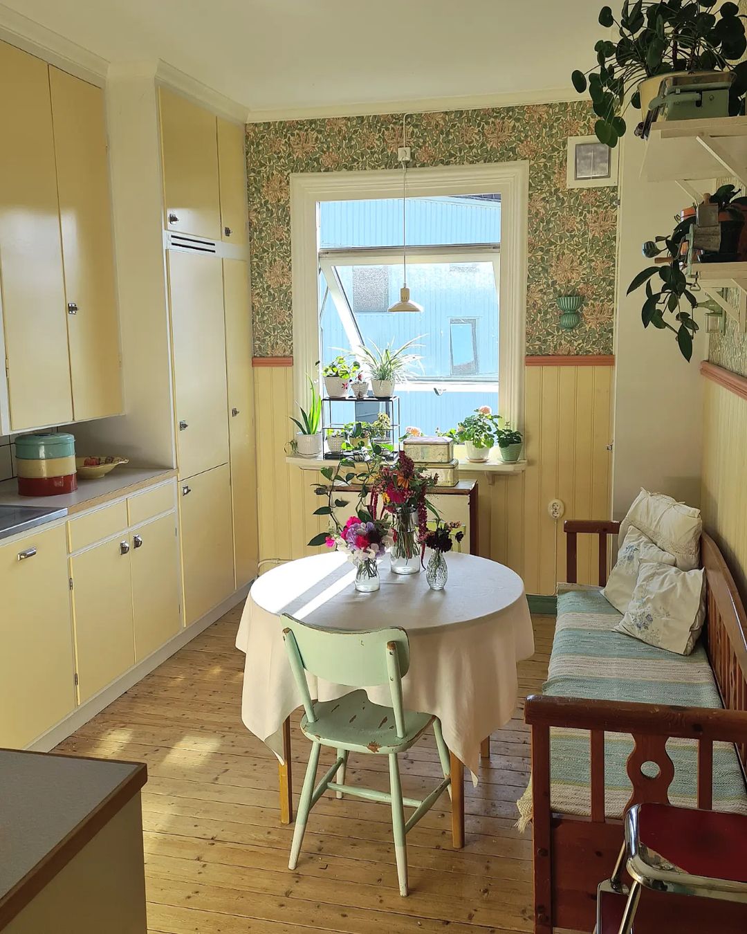 Cheerful Yellow Cabinets with Vintage Flair