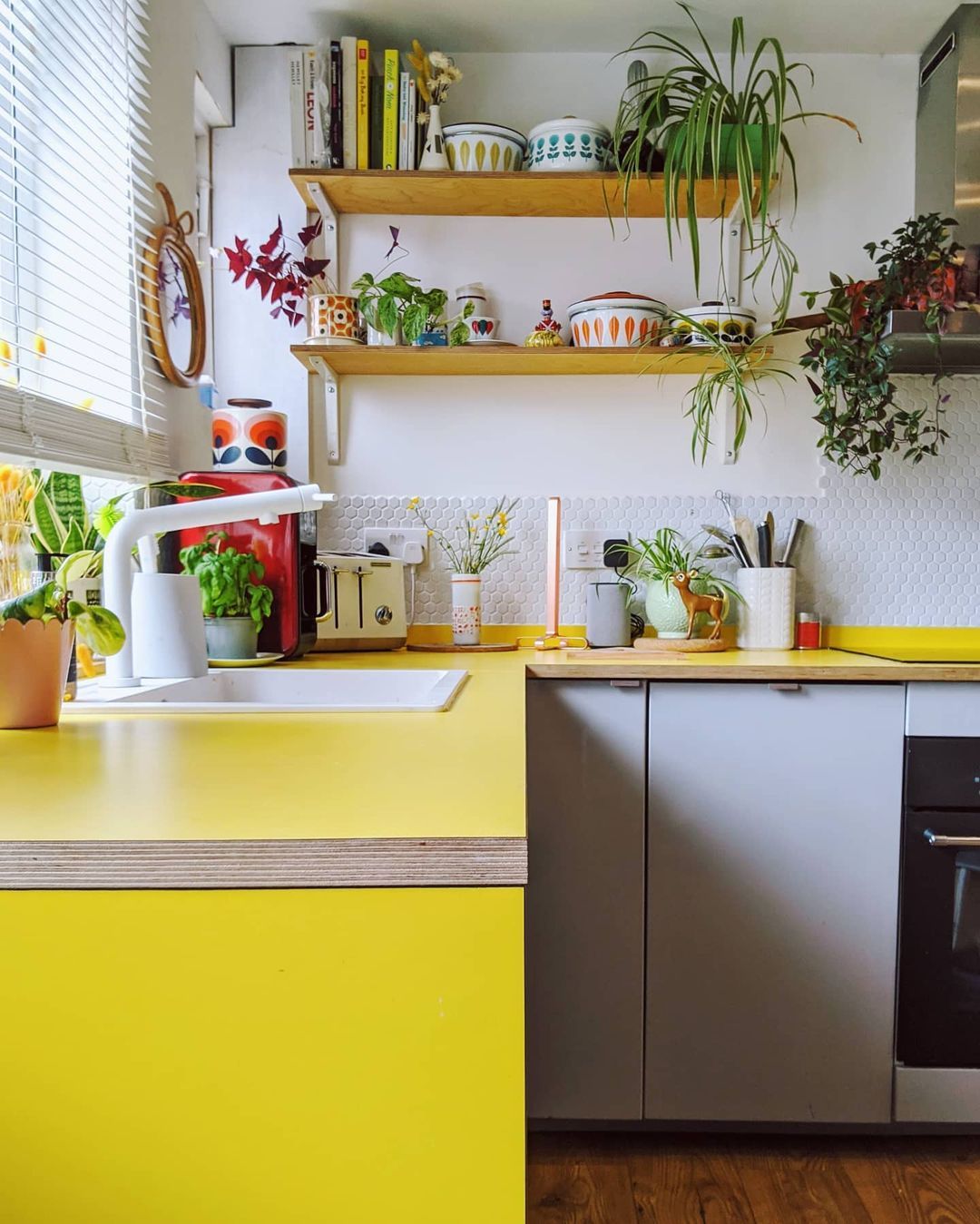 Bright Yellow Countertops with Open Shelving