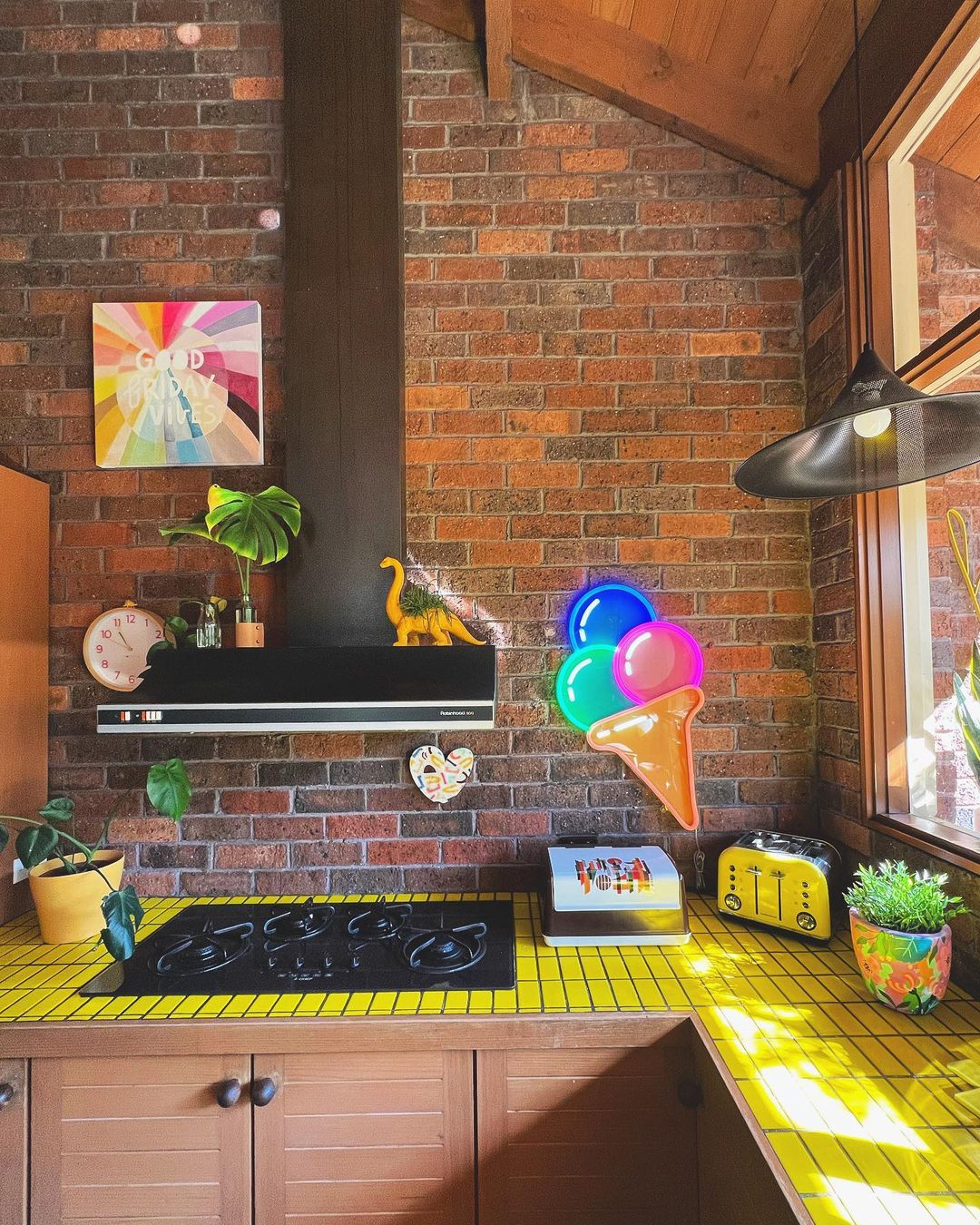 Bright Yellow Tile Countertops with Brick Walls