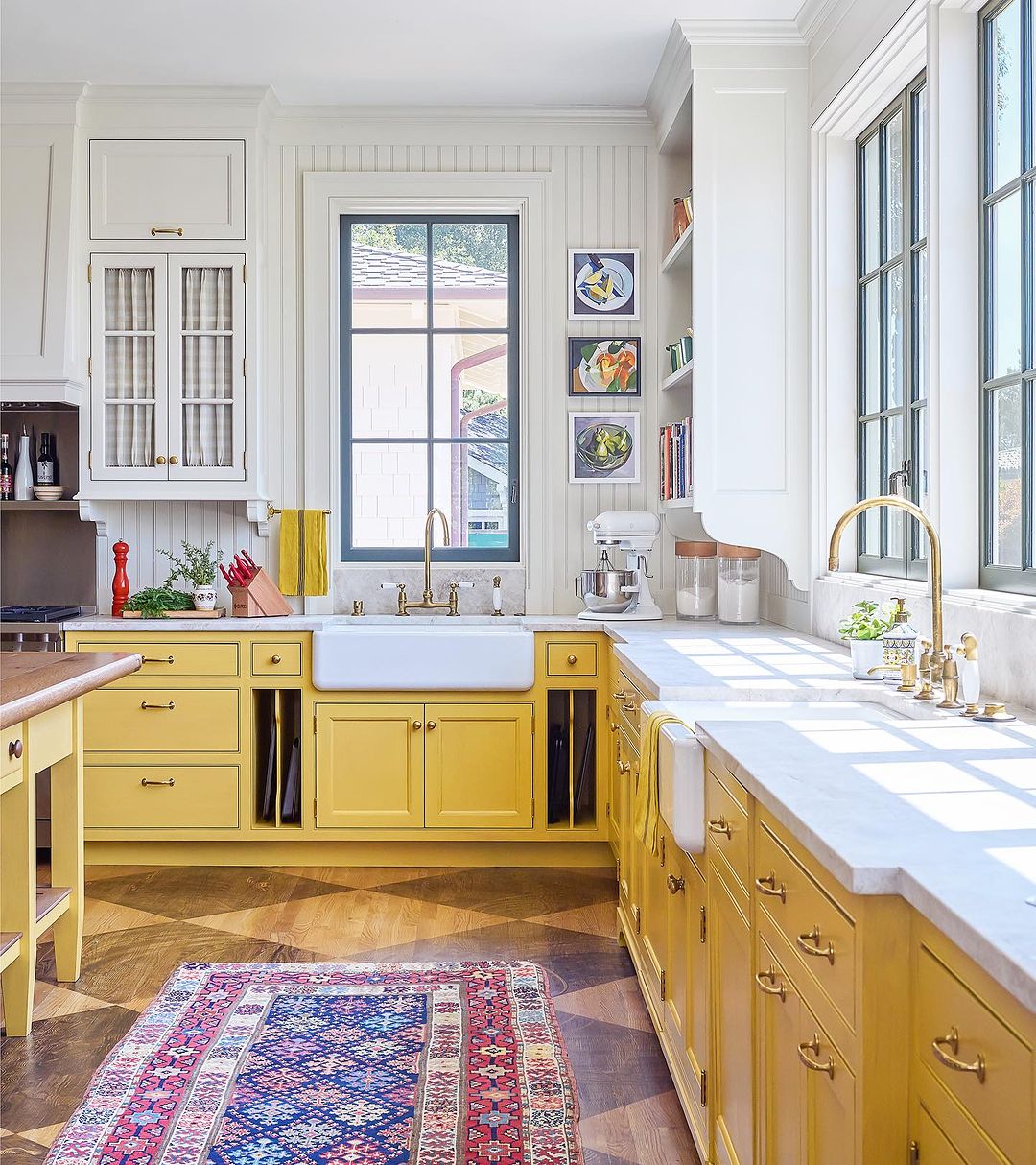 Classic Yellow Cabinets with Farmhouse Sin